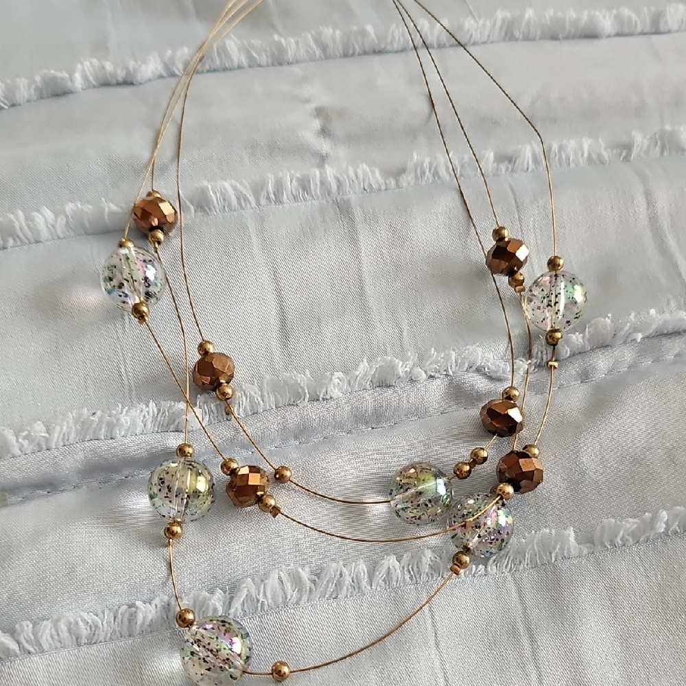 Elegant Gold and Silver Beaded Necklace